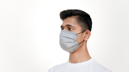 young man with mask side pose