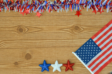 Celebrating Independence Day July 4th, President's Day, Memorial Day, Labor Day, Veteran's Day, Great America. United states flag on a wooden background with blue, white and red stars.