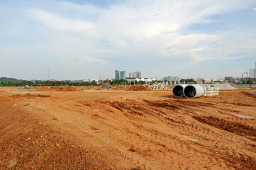 Naklejka premium KUALA LUMPUR, MALAYSIA -MARCH 5, 2020:The construction site is operating during the day. Workers are busy carrying out their activities as planned under the supervisor's supervision. 