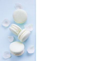Tasty macaroons, light blue background, empty space for text