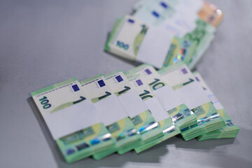 banknotes in front of electronic money counting machine