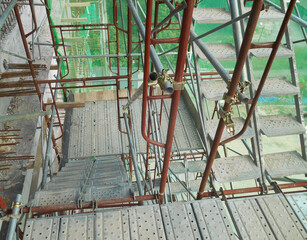 MALACCA, MALAYSIA -SEPTEMBER 23, 2016: Temporary access and staircase supported by reinforced scaffolding at the construction site. Used by construction workers.  