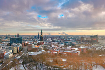 Scenic panorama view from Dancing Towers over Hamburg under snow in winter with Michel,...