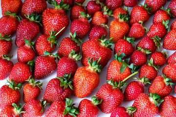 Ripe red strawberries layout with copy space
