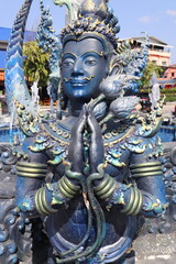 Statue du Wat Rong Seua Ten ou temple bleu à Chiang Rai, Thaïlande