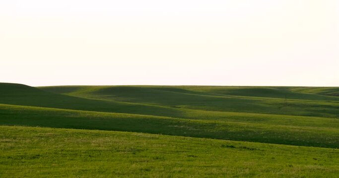 flint hills rolling hills medium shadows at sunset