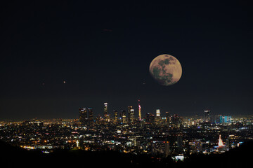 moon over the city - Powered by Adobe