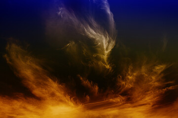 Dramatic cirrus clouds and vapour trails with color.