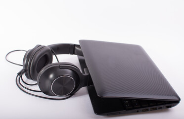 headphones black and laptop close up