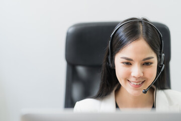 Young business asian woman working call centre customer service agents. Business female support...
