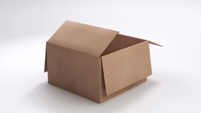 Beautiful Opening and Closing Cardboard Box Closeup View on White Background with Mask. Looped 3D animation with change package box for online delivery Ultra HD 4K