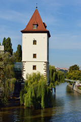 Fototapeta na wymiar At southern tip of Children's island there is water tower, called Petrziikovska. Prague, Czech Republic
