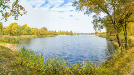 Autumn outdoor landscape, panorama. Lake in the forest. Tourism and Travel - Kyiv (Kiev), Ukraine, Europe.