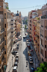 Aerial view of a boulevard passing Torres de Quart in Valencia, Spain