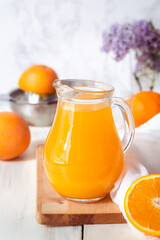 Fototapeta na wymiar jar of fresh orange juice