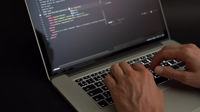 Person coding HTML and programming on screen laptop, development web, developer.