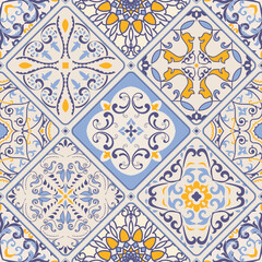 Seamless colorful patchwork. Azulejos tiles patchwork. Majolica pottery tile, blue, yellow azulejo. Original traditional Portuguese and Spain decor. Islam, Arabic, Indian, Ottoman motifs