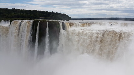 photograph of the famous, grandiose and mighty Iguazu Falls, which give off magical water vapor, seen from the Brazilian side