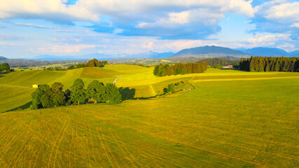 Fototapeta na wymiar Flight over the beautiful rural landscape of Bavaria Allgau in the German Alps. Aerial view