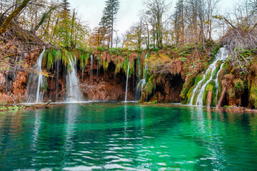 Plitvice Lakes Park with waterfalls in autumn