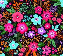 Amazing seamless floral pattern with bright colorful flowers and leaves on a black background. The elegant the template for fashion prints. Modern floral background. Folk style.