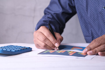 businessman analyzing financial data at office desk 