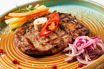 Grilled beef steak with butter salt and pepper