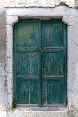 Fototapeta na wymiar Beautiful Wooden Door Of A Typical House In Pyrgos Kallistis On The Island Of Santorini.