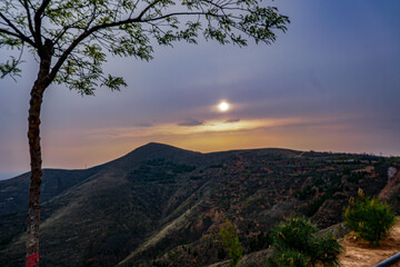 Fototapeta premium sunset over the mountains