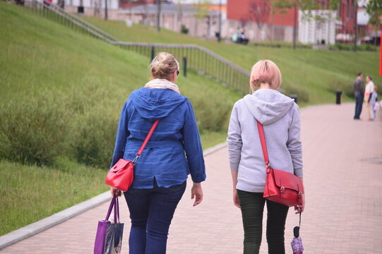 Senior Woman Walking On Crutches