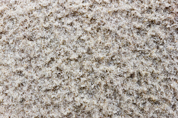 texture of wet sand after rain surface close up