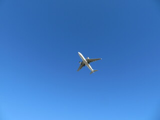 Fototapeta na wymiar Beautiful photo of a plane landing at the airport taking land