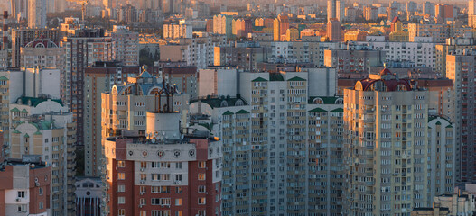 View of crowded apartment blocks background. Modern city urban buildings background pattern.