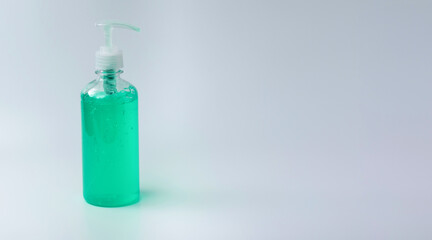 Hand sanitizer green gel for cleaning, clear and prevent spread of virus, bacteria and germs isolated on white background.