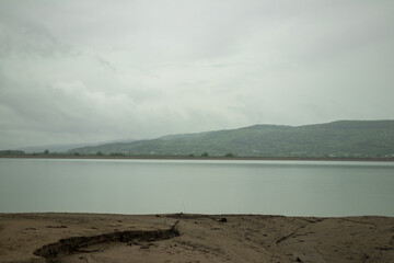 The lake in a cloudy day rain and reflections
