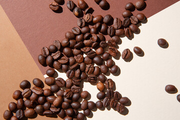 Coffee beans viewed from above on a background of different colors