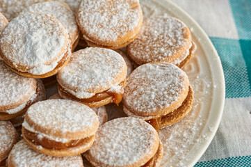 Alfajores: Traditional Peruvian cookies filled with caramel and white sugar dust on top.