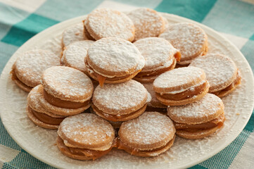 Alfajores: Traditional Peruvian cookies filled with caramel and white sugar dust on top.