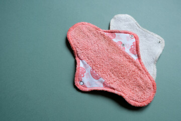 Reusable cloth sanitary menstrual pads. Zero waste period. Feminine washable, eco friendly personal hygiene supplies. Womens health care. Sustainable waste-free living.