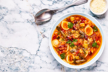 Minestrone, italian vegetable soup with pasta and beans.