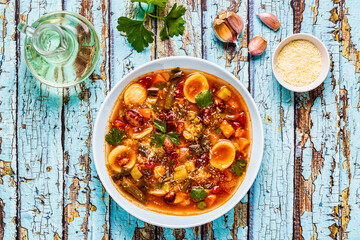 Minestrone, italian vegetable soup with pasta and beans.