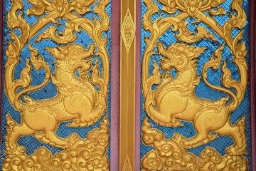 Fototapeta na wymiar Image of a lion inside a Thai temple
