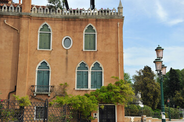 Venice colorful houses near the channels and towers