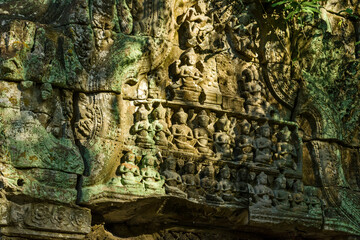 A bas-relief over an entrance at Ta Prohm, Siem Reap, Cambodia