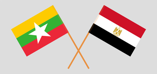Crossed flags of Egypt and Myanmar