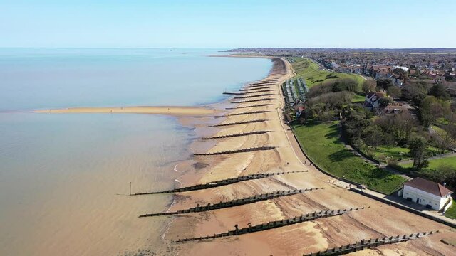 An aerial view of an empty sandy beach. Pandemic quarantine. Whitstable, Kent, UK