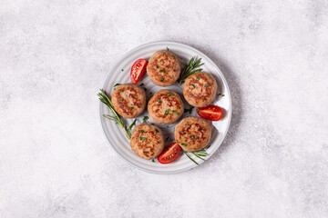 Fresh chiken cutlets with tomatoes and rosemary