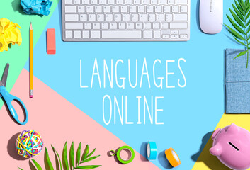 Languages online theme with office supplies and a computer keyboard