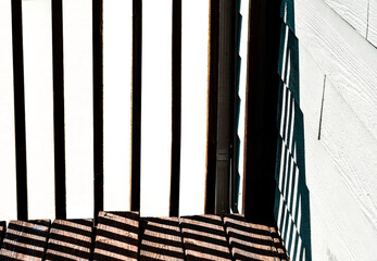 Isolated image of a deck portraying repetition of lines and shadows 