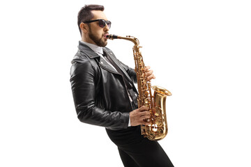 Fototapeta na wymiar Male musician in a leather jacket playing a saxophone